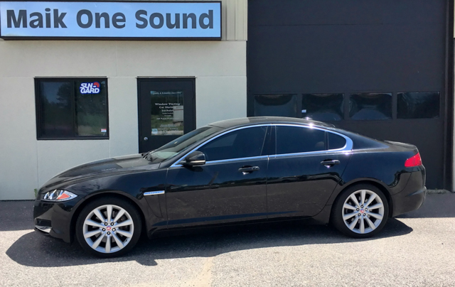 2016 Jaguar XF with professional window tint in North Bay